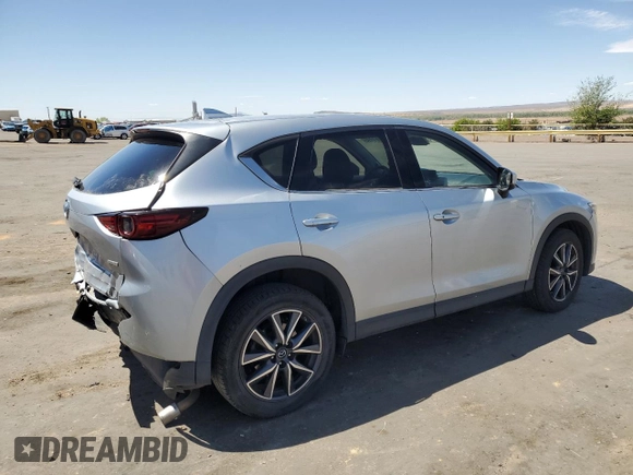 2018 Mazda CX-5 Grand Touring with VIN JM3KFBDM3J0319157, listed as a Copart auction lot 53891095 with 133,189 mi miles and Salvage Title. Bid and sale history available at DreamBid. Image 3.