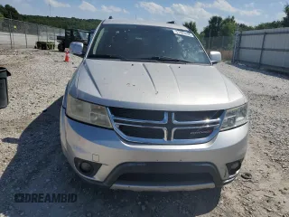 2012 Dodge Journey SXT z VIN 3C4PDDBG3CT360536, wystawiony jako Copart lot #57483455 z przebiegiem 135 278 mil mil oraz Czysty tytuł • Clean title. Historia ofert i sprzedaży dostępna na DreamBid. Obrazek 5.