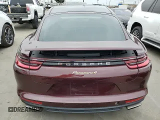2018 Porsche Panamera 4 E-Hybrid с VIN WP0AE2A76JL128093, выставлен на аукционе Copart как лот 61402255 с пробегом 85 980 миль миль и Списание • Salvage title. История ставок и продаж доступна на DreamBid. Изображение 6.
