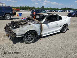 1996 Ford Mustang Cobra с VIN 1FALP47V4TF118643, выставлен на аукционе Copart как лот 57999885 с пробегом Не указан миль и Списание • Salvage title. История ставок и продаж доступна на DreamBid. Изображение 1.