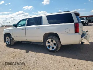 2015 Chevrolet Suburban LTZ with VIN 1GNSCKKC6FR705660, listed as a Copart auction lot 60328685 with 174,247 mi miles and Salvage title. Bid and sale history available at DreamBid. Image 2.