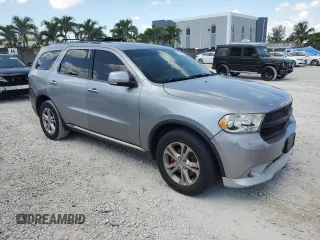 2013 Dodge Durango Crew z VIN 1C4RDJDGXDC696119, wystawiony jako Copart lot #58226905 z przebiegiem 154 915 mil mil oraz Czysty tytuł • Clean title. Historia ofert i sprzedaży dostępna na DreamBid. Obrazek 4.
