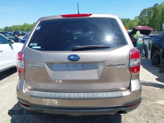 2014 Subaru Forester 2.5i with VIN JF2SJAAC4EH516103, listed as a IAAI auction lot 42065064 with 140,531 mi miles and . Bid and sale history available at DreamBid. Image 16.