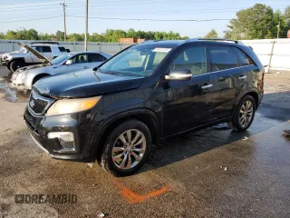 2012 Kia Sorento SX with VIN 5XYKW4A22CG209690, listed as a Copart auction lot 53631965 with 217,786 mi miles and Salvage title. Bid and sale history available at DreamBid. Image 1.