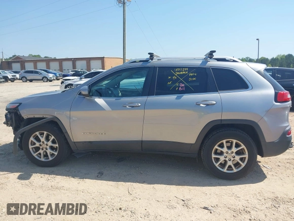 2015 Jeep Cherokee Latitude with VIN 1C4PJMCB6FW691816, listed as a IAAI auction lot 42026070 with 179,054 mi miles and . Bid and sale history available at DreamBid. Image 14.