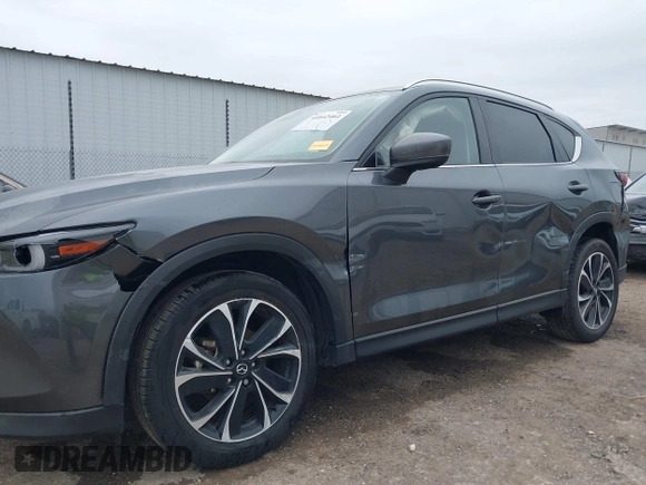 2023 Mazda CX-5 2.5 S Premium Plus Package with VIN JM3KFBEM2P0163054, listed as a IAAI auction lot 41642461 with 18,508 mi miles. Bid and sale history available at carsss.com. Image 6.