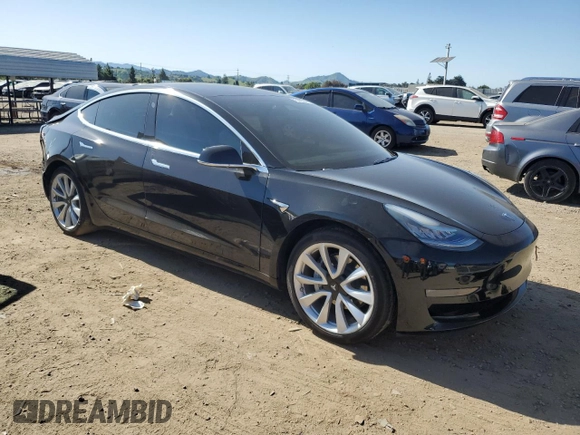 2019 Tesla Model 3 Mid Range with VIN 5YJ3E1EA0KF345393, listed as a Copart auction lot 51508305 with 38,903 mi miles and Salvage Title. Bid and sale history available at DreamBid. Image 4.