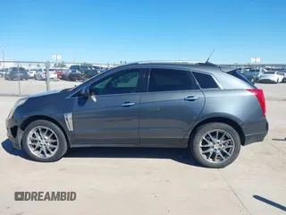 2013 Cadillac SRX Performance Collection with VIN 3GYFNDE38DS568561, listed as a IAAI auction lot 41701063 with 139,191 mi miles. Bid and sale history available at carsss.com. Image 14.