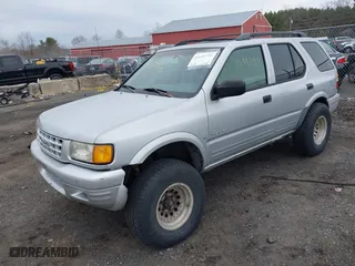 1998 Isuzu Rodeo S with VIN 4S2CM58W6W4375632, listed as a IAAI auction lot 41659797 with 195,732 mi miles. Bid and sale history available at carsss.com. Image 2.