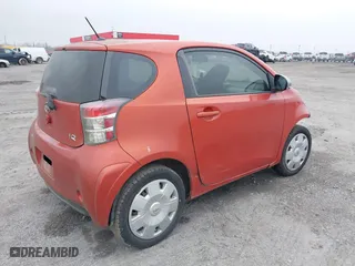2012 Scion iQ with VIN JTNJJXB03CJ021023, listed as a IAAI auction lot 41487646 with 143,735 mi miles. Bid and sale history available at carsss.com. Image 4.