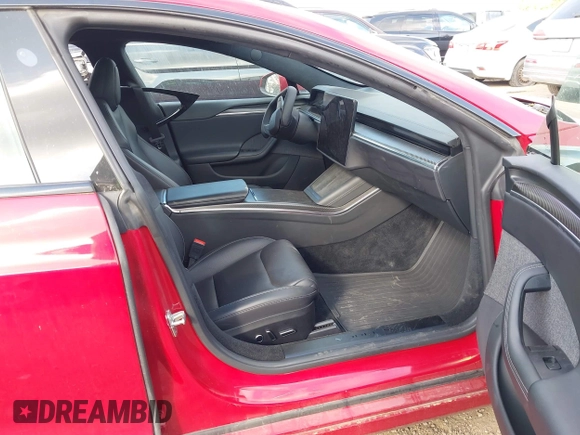 2021 Tesla Model S Plaid with VIN 5YJSA1E60MF447203, listed as a IAAI auction lot 42025120 with 58,190 mi miles. Bid and sale history available at carsss.com. Image 5.