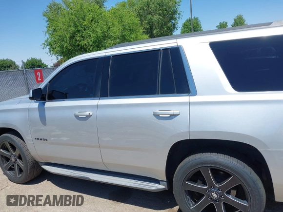 2015 Chevrolet Tahoe LT with VIN 1GNSCBKC9FR111001, listed as a IAAI auction lot 42440624 with 128,087 mi miles and . Bid and sale history available at DreamBid. Image 13.