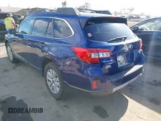 2015 Subaru Outback Premium with VIN 4S4BSBDC2F3290862, listed as a IAAI auction lot 42011007 with 152,628 mi miles and . Bid and sale history available at DreamBid. Image 3.