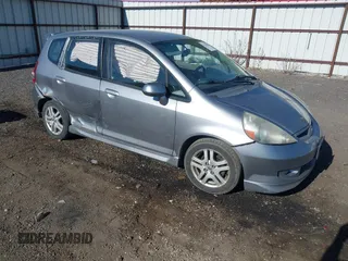 2007 Honda Fit Sport z VIN JHMGD37657S055233, wystawiony jako IAAI lot #42194843 z przebiegiem 190 715 mil mil oraz . Historia ofert i sprzedaży dostępna na DreamBid. Obrazek 1.