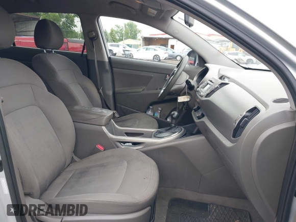 2011 Kia Sportage LX z VIN KNDPB3A24B7099054, wystawiony jako IAAI lot #42358614 z przebiegiem 211 143 mil mil oraz . Historia ofert i sprzedaży dostępna na DreamBid. Obrazek 5.