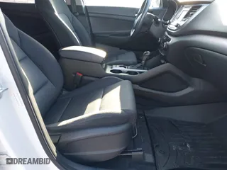 2017 Hyundai Tucson Value with VIN KM8J33A28HU533047, listed as a IAAI auction lot 41853087 with 74,238 mi miles. Bid and sale history available at carsss.com. Image 5.