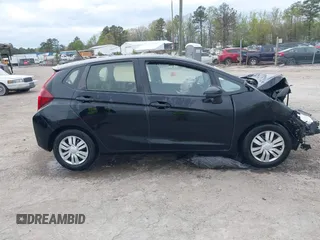2016 Honda Fit LX with VIN JHMGK5H5XGX019435, listed as a IAAI auction lot 42009756 with 71,757 mi miles and . Bid and sale history available at DreamBid. Image 13.