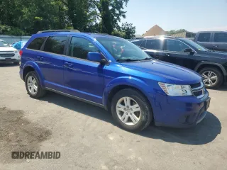 2012 Dodge Journey SXT with VIN 3C4PDCBB6CT324709, listed as a Copart auction lot 63300405 with 179,946 mi miles and Salvage title. Bid and sale history available at DreamBid. Image 4.