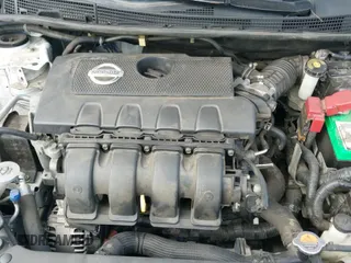 2015 Nissan Sentra S z VIN 3N1AB7AP6FY240545, wystawiony jako IAAI lot #43291152 z przebiegiem 136 652 mil mil oraz . Historia ofert i sprzedaży dostępna na DreamBid. Obrazek 12.