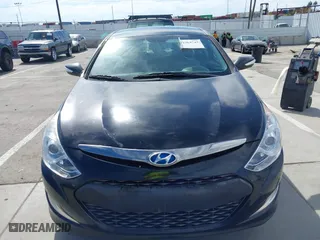 2013 Hyundai Sonata Hybrid Limited with VIN KMHEC4A44DA099701, listed as a IAAI auction lot 41964745 with 61,108 mi miles. Bid and sale history available at carsss.com. Image 11.