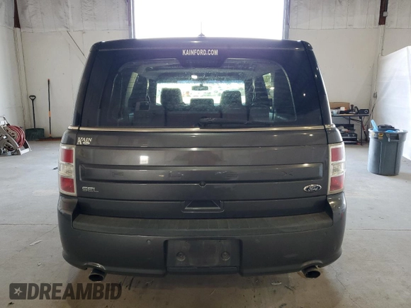 2015 Ford Flex SEL z VIN 2FMGK5C86FBA03477, wystawiony jako Copart lot #53562725 z przebiegiem 136 616 mil mil oraz Tytuł czysty. Historia ofert i sprzedaży dostępna na DreamBid. Obrazek 6.