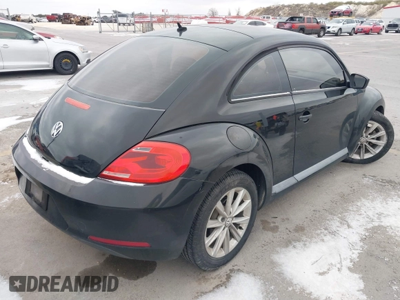 2013 Volkswagen Beetle Entry with VIN 3VWFP7AT8DM644840, listed as a IAAI auction lot 41387843 with 195,597 mi miles and . Bid and sale history available at DreamBid. Image 4.