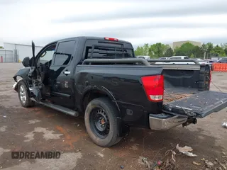 2011 Nissan Titan SL with VIN 1N6BA0ECXBN319286, listed as a IAAI auction lot 42072645 with 304,015 mi miles and . Bid and sale history available at DreamBid. Image 3.