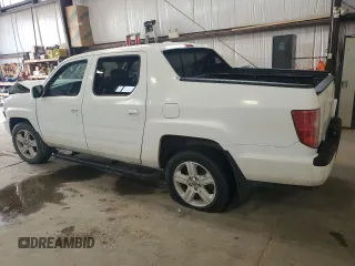 2012 Honda Ridgeline RTL with VIN 5FPYK1F59CB501178, listed as a Copart auction lot 60634535 with 165,766 mi miles and Salvage title. Bid and sale history available at DreamBid. Image 2.
