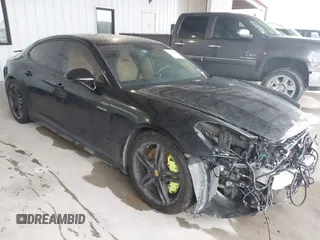 2018 Porsche Panamera 4 E-Hybrid z VIN WP0AE2A73JL128262, wystawiony jako IAAI lot #41841905 z przebiegiem 95 821 mil mil oraz . Historia ofert i sprzedaży dostępna na DreamBid. Obrazek 1.