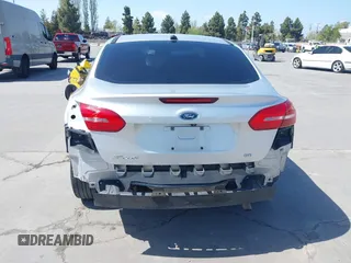 2016 Ford Focus SE with VIN 1FADP3F27GL322186, listed as a IAAI auction lot 42062320 with 131,007 mi miles and . Bid and sale history available at carsss.com. Image 6.