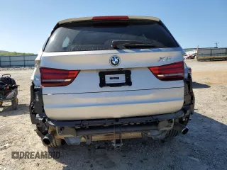2014 BMW X5 xDrive35i with VIN 5UXKR0C55E0H23681, listed as a Copart auction lot 52183885 with 142,290 mi miles and Salvage Title. Bid and sale history available at carsss.com. Image 6.