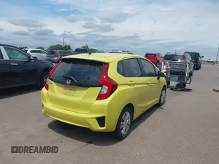 2015 Honda Fit LX z VIN 3HGGK5H58FM768970, wystawiony jako IAAI lot #42760686 z przebiegiem 89 531 mil mil oraz . Historia ofert i sprzedaży dostępna na DreamBid. Obrazek 4.