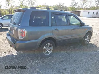2007 Honda Pilot EX-L with VIN 2HKYF18727H528564, listed as a IAAI auction lot 42010708 with 260,364 mi miles and . Bid and sale history available at DreamBid. Image 4.