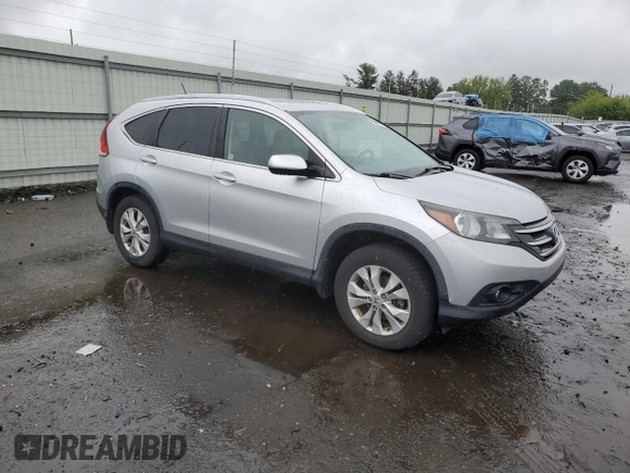 2013 Honda CR-V EX-L z VIN 2HKRM4H76DH634037, wystawiony jako Copart lot #57985265 z przebiegiem 80 399 mil mil oraz Szkody całkowita. Historia ofert i sprzedaży dostępna na DreamBid. Obrazek 4.