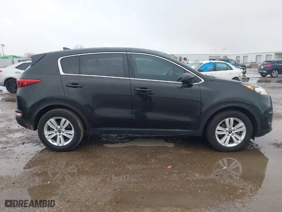 2019 Kia Sportage LX with VIN KNDPM3AC3K7598317, listed as a IAAI auction lot 41591811 with 84,959 mi miles. Bid and sale history available at carsss.com. Image 13.