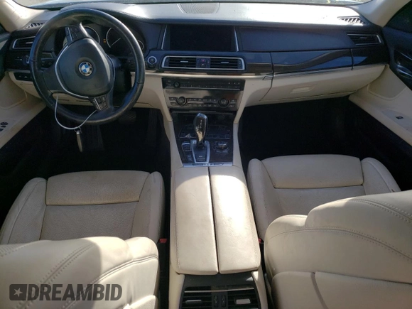 2013 BMW 7 Series 750i with VIN WBAYA8C55DC996693, listed as a Copart auction lot 80233423 with 140,925 mi miles and Salvage Title. Bid and sale history available at DreamBid. Image 8.