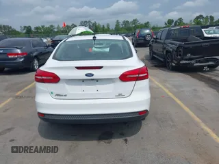2015 Ford Focus SE with VIN 1FADP3F28FL204145, listed as a IAAI auction lot 42107720 with 129,441 mi miles and . Bid and sale history available at DreamBid. Image 17.