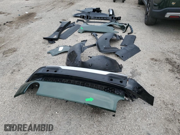 2023 Rivian R1T Adventure z VIN 7FCTGAAA8PN001040, wystawiony jako Copart lot #71517874 z przebiegiem 19 789 mil mil oraz Szkoda całkowita • Salvage title. Historia ofert i sprzedaży dostępna na DreamBid. Obrazek 12.