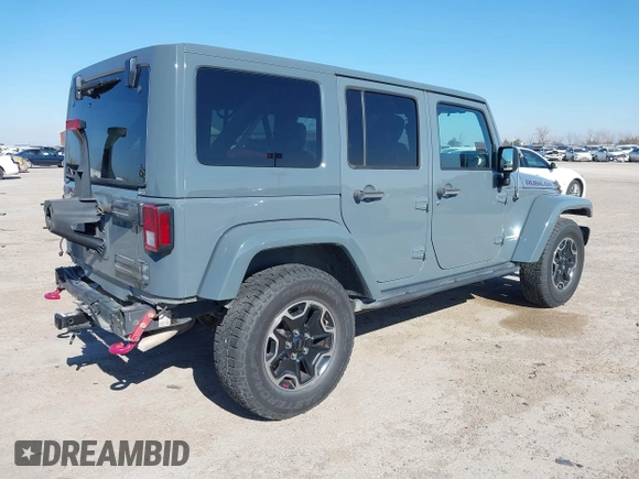 2015 Jeep Wrangler Unlimited Rubicon with VIN 1C4BJWFG7FL525724, listed as a IAAI auction lot 41394059 with 132,058 mi miles. Bid and sale history available at carsss.com. Image 4.