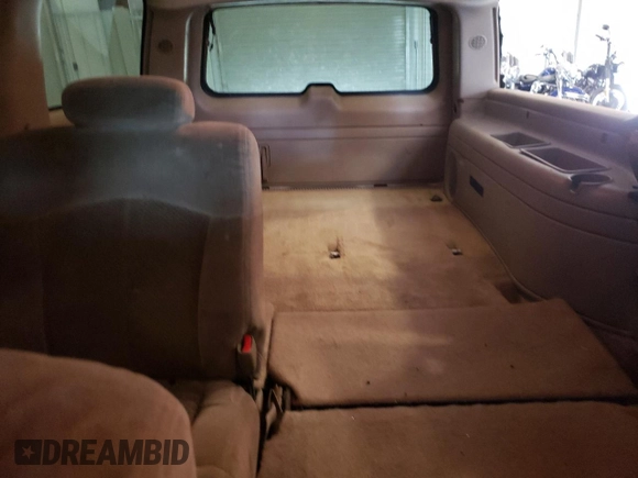 2002 Chevrolet Suburban LS with VIN 1GNFK16Z12J326815, listed as a Copart auction lot 63348745 with 296,618 mi miles and Salvage title. Bid and sale history available at DreamBid. Image 10.