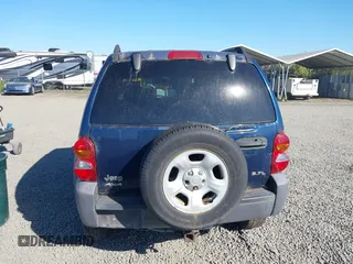 2003 Jeep Liberty Sport with VIN 1J4GL48K83W663248, listed as a IAAI auction lot 42056561 with 161,652 mi miles. Bid and sale history available at carsss.com. Image 16.