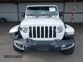 2021 Jeep Gladiator Willys with VIN 1C6HJTAG0ML505674, listed as a IAAI auction lot 42249317 with 60,150 mi miles and . Bid and sale history available at DreamBid. Image 12.