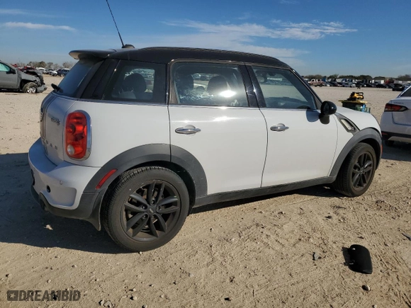 2014 MINI Cooper Countryman S with VIN WMWZC3C50EWT00792, listed as a Copart auction lot 87270074 with 52,525 mi miles and Salvage Title. Bid and sale history available at carsss.com. Image 3.