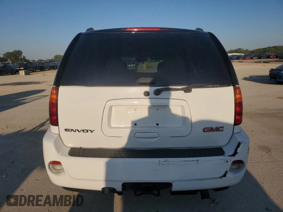 2006 GMC Envoy Denali with VIN 1GKET63M662228794, listed as a Copart auction lot 70802804 with 134,323 mi miles and Salvage Title. Bid and sale history available at DreamBid. Image 6.