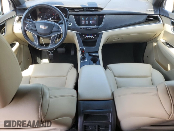 2017 Cadillac XT5 FWD with VIN 1GYKNARS2HZ131243, listed as a Copart auction lot 54189395 with 134,324 mi miles and Salvage Title. Bid and sale history available at DreamBid. Image 8.