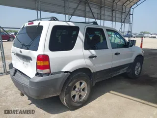 2005 Ford Escape XLT with VIN 1FMYU93155KA43398, listed as a IAAI auction lot 41930802 with 115,755 mi miles. Bid and sale history available at carsss.com. Image 4.