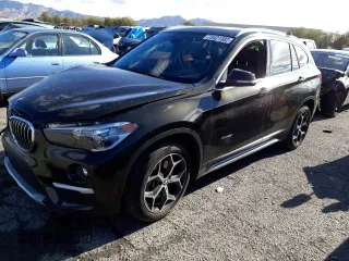 2018 BMW X1 xDrive28i with VIN WBXHT3C34J5K28026, listed as a Copart auction lot 73421382 with 54,327 mi miles. Bid and sale history available at carsss.com. Image 1.