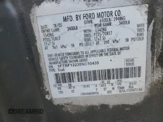 2005 Ford F-150 XL with VIN 1FTRF12235NC10435, listed as a Copart auction lot 57311935 with 249,847 mi miles and Salvage title. Bid and sale history available at DreamBid. Image 13.
