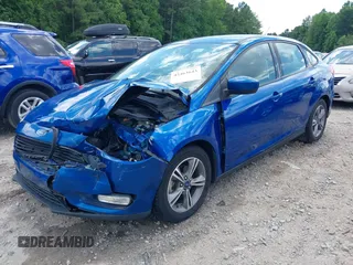 2018 Ford Focus SE with VIN 1FADP3FE8JL238024, listed as a IAAI auction lot 42463643 with Not provided miles and . Bid and sale history available at DreamBid. Image 17.