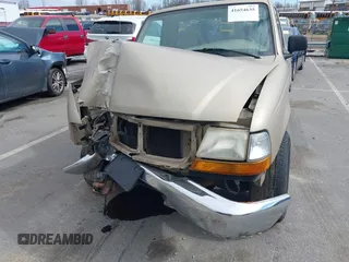 1999 Ford Ranger XL with VIN 1FTYR10V1XTA41899, listed as a IAAI auction lot 41654635 with 150,444 mi miles. Bid and sale history available at carsss.com. Image 14.